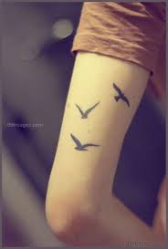 Attractive Simple Bird Tattoo On Hand Pin By Kayci Martin On Piercings And Cute Tattoos Bird Tattoos Arm