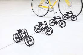 studio yumakano bike stand is a playful sign for cyclists to park bike stand bicycle bicycle stand