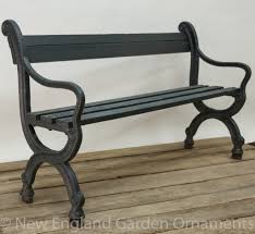 Custom, industrial bench features an ebonized, reclaimed maple top with cast iron legs that are height adjustable from. Antique Cast Iron Bench New England Garden Company