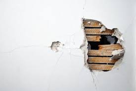 Patching drywall holes under sink. 4 Simple Steps For Repairing Water Damaged Drywall