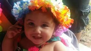 Stella Raises Her Arms in Victory