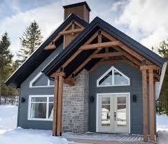 Le Modele Saint Anne Fait Rever Par Son Aspect Naturel Et Ses Ouvertures Qui Illumineront Votre Interieur House Exterior Exterior House Colors Pole Barn Homes