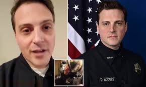 Capitol cop who was filmed screaming for help as he was crushed against  metal door is named