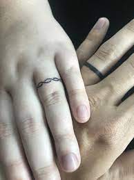 Our Wedding Ring Tattoos Celticringsweddingstyle Tattoo Wedding Rings Ring Tattoo Designs Wedding Band Tattoo