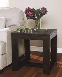 Featuring two open shelves, you can access your décor and essentials no matter what side of the coffee table you are on. Watson End Table Kimbrell S Furniture