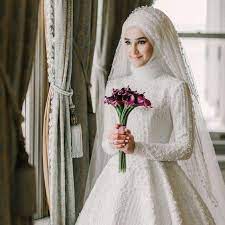 اجمل صور عرايس صور عرايس مبهجه جدا صور عرايس محجبات جميلة جدا اشيك وارق عرايس 2021 in 2021 muslimah wedding dress muslim wedding gown muslim wedding dresses