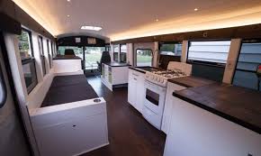 Solar Powered Home On Wheels Frees Us Couple From The 9 5 Grind School Bus Tiny House School Bus Rv Conversion Bus House