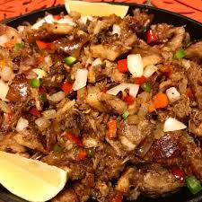 Lechon Sisig Is A Dish To Made Using Left Over Lechon Or Lechon Kawali This Recipe Is So Full Of Flavor And Great As A Lechon Recipe Sisig Recipe Pork Recipes