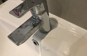 yellow stains on bathroom sink