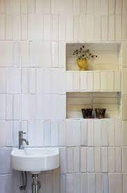 I stacked it up to the ceiling behind my cooktop/hood and above some windows. Bathroom Trends Are Stacked Tiles The New Subway Tile
