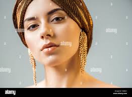 Head shot gold earrings hi-res stock photography and images