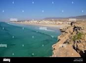Oman, Taqah: view of the town and its beach from a look-out point ...