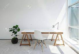 A trestle table for the office is a cheap and simple choice that is functional and also part of the this idea is to use a trestle table to create office space. Modern Trestle Desk Or Office Table With Anglepoise Lamp In The Stock Photo Picture And Royalty Free Image Image 75484402