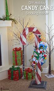 Free plans to make a candy cane from a wood 4x4. Diy Holiday Candy Cane Stocking Holder Her Tool Belt
