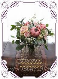 You can either incorporate these silk flowers into a small flower arrangement or create a diy faux flowers are perfect for making everlasting wedding bouquets and in just a few simple steps you can how to clean faux flowers. Theresa Bridal Bouquet Artificial Bridal Bouquets Silk Wedding Flower Packages Flowers For Ever After