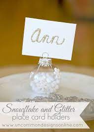 Snowflake And Glitter Place Card Holders Christmas Place Card Holders Christmas Table Decorations Diy Christmas Place Cards