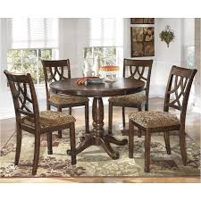 It is extremely sturdy for an affordable dining/nook table and fits into a reasonably smaller space if necessary. D436 15t Ashley Furniture Round Dining Room Table