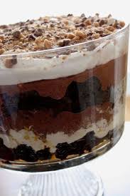 This brownie trifle recipe is one tasty, showstopper of a dessert. Chocolate Brownie Trifle The Red Headed Hostess Desserts Delicious Desserts Dessert Recipes