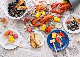 Transfer the shellfish, sausage and vegetables to bowls or platters and serve with the lemon wedges, melted butter and old bay seasoning. Guide To Lobsterbake Clambake Caterers In Connecticut Ct Bites