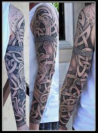 Grey celtic irish tattoo on bicep. 27 Irish Tattoos On Sleeve