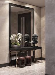 The cupboards stretch nearly to the ceiling and are in line with the main door entrance. Luxury Entryway With The Most Captivating Mirrors