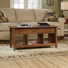 A hidden storage compartment beneath the top allows you to store blankets and board games within easy access. Sauder Edge Water Lift Top Coffee Table Auburn Cherry Finish Walmart Com Walmart Com
