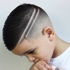 First, wash your kid's hair and properly hydrate it, curling the hair with your fingers to give it more definition. Men S Hair Haircuts Fade Haircuts Short Medium Long Buzzed Side Part Long Top Short Sides Hair Style Boy Haircuts Short Boys Haircuts Kids Hairstyles