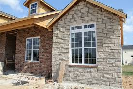 Only a d compiler is required. It Also Shows The Brick Detail Under The Windows And The Transom Above The 3 X 6 Windows On The Stone Wal Stone Exterior Houses Exterior Brick Exterior Stone