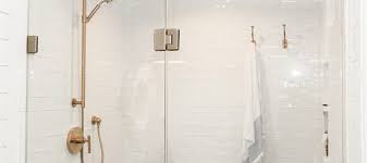12 inspirational walk in shower designs fit for any bathroom cloudy glass shower doors this puzzled look has a beautiful finish that reacts to the incredibly chic and modern atmosphere of the ambience.the door has a shattered accent that creates a magical focal point in a very clean and clever way. Glass Shower Door Buying Guide H J Martin And Son