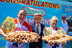 Champions joey chestnut and michelle lesco seen at the contest. Joey Chestnut Wins Nathan S Hot Dog Eating Contest Downing 71 Dogs In 10 Minutes The Brooklyn Home Reporter