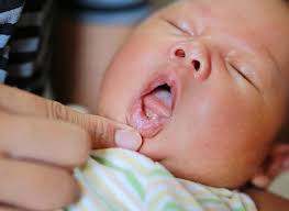 Why Your Baby May Be Sticking Their Tongue Out Bright Side