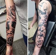 These two sides symbolize two facets of love: 50 Skull Sleeve Tattoos For Men Masculine Design Ideas