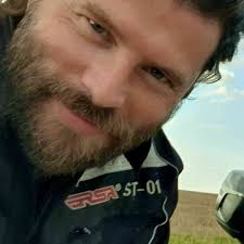 The engine smoke comes from oil leaking out of the valve cover and onto the  exhaust headers. Spark plug well gaskets can be a problem