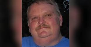 Guy M. Button Obituary