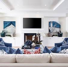 What hamptons living room ideas are you rocking? Blue And White Hamptons Style Lounge Room With Fireplace And Tv Above Hamptons Living Room Family Room Design Family Living Rooms