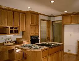 When you start looking for kitchen cabinets, think about what aspects of your kitchen style and materials you would like to introduce to your kitchen. How To Darken Cabinets Without Removing Polyurethane Warm Inviting Shades Of Walnu Stained Kitchen Cabinets Restaining Kitchen Cabinets Wood Kitchen Cabinets