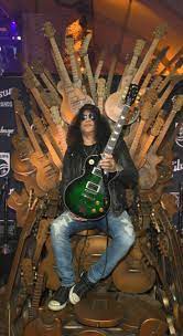 You Might Be Cool But You Ll Never Be Slash Sitting On A Throne Of Guitars Cool Just Sayin Best Guitar Players Guitar Tips Guitar For Beginners