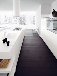 The kitchen has two handmade backsplashes: 3 Dark Floors Types And 26 Ideas To Pull Them Off Digsdigs