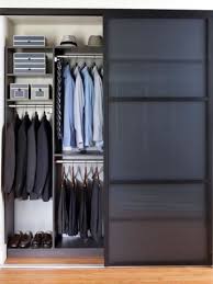Slatted doors match the unique wall feature along the leftmost wall of this stylish modern bedroom. Modern Wardrobe Design Ideas For Small Bedroom