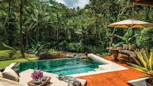 Balinese Style Swimming Pool Design For Small Spaces With Wooden Decking Overlooking A Lush Rainforest Expert Tips To Creat Bali Hotels Resort Honeymoon Hotels