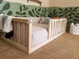 House beds are trending right now for toddlers and kids because they work with montessori style bedrooms, and are so easy to diy! Diy Montessori Floor Bed Natural Living Homestead