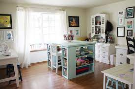Pull up a chair on either side of the table to craft with a friend. Sewing Room Ideas The Seasoned Homemaker