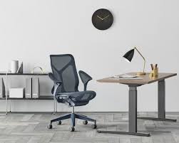 The Herman Miller Cosm Tilts Itself Into The Best Position Possible Blue Chairs Living Room Accent Chairs For Living Room Wooden Office Chair