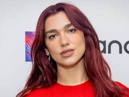 Dua Lipa Paints Hollywood Red in Stunning Satin Corset Gown