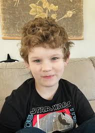 This kid is so excited. Why? He is scheduled for port removal