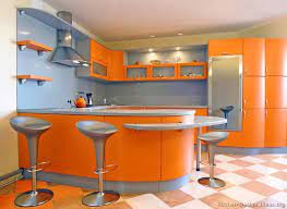 Modern Orange Kitchen With Curved Cabinets Orange Kitchen Orange Kitchen Cabinets Metal Kitchen Cabinets