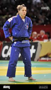 Frances Audrey La Rizza (blue) battles with Japans Misato Nakamura  (White) in the women -52 kg category during the Judo Paris International  tournament at the Bercy stadium in Paris, France on February