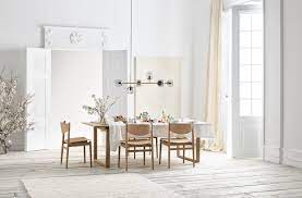 Made of wood, veneer and engineered wood with a rich dark brown finish and diamond matched veneer inlay tabletop Dining Room Furniture