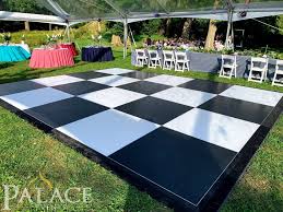 Black White Dance Floor For A Wedding Reception At Prairie Glass House Tent Tables Chairs Linens Dance Floo In 2020 Wedding Reception Wedding Rentals Reception