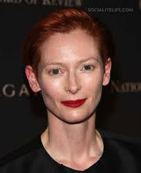 Tilda Swinton Her Hair Is Reportedly Naturally Red But She Enhances Her Natural Red Hair Color By Making People With Red Hair Red Hair Color Natural Red Hair